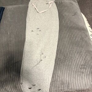 Women’s grey sweatpants with cut outs, size small